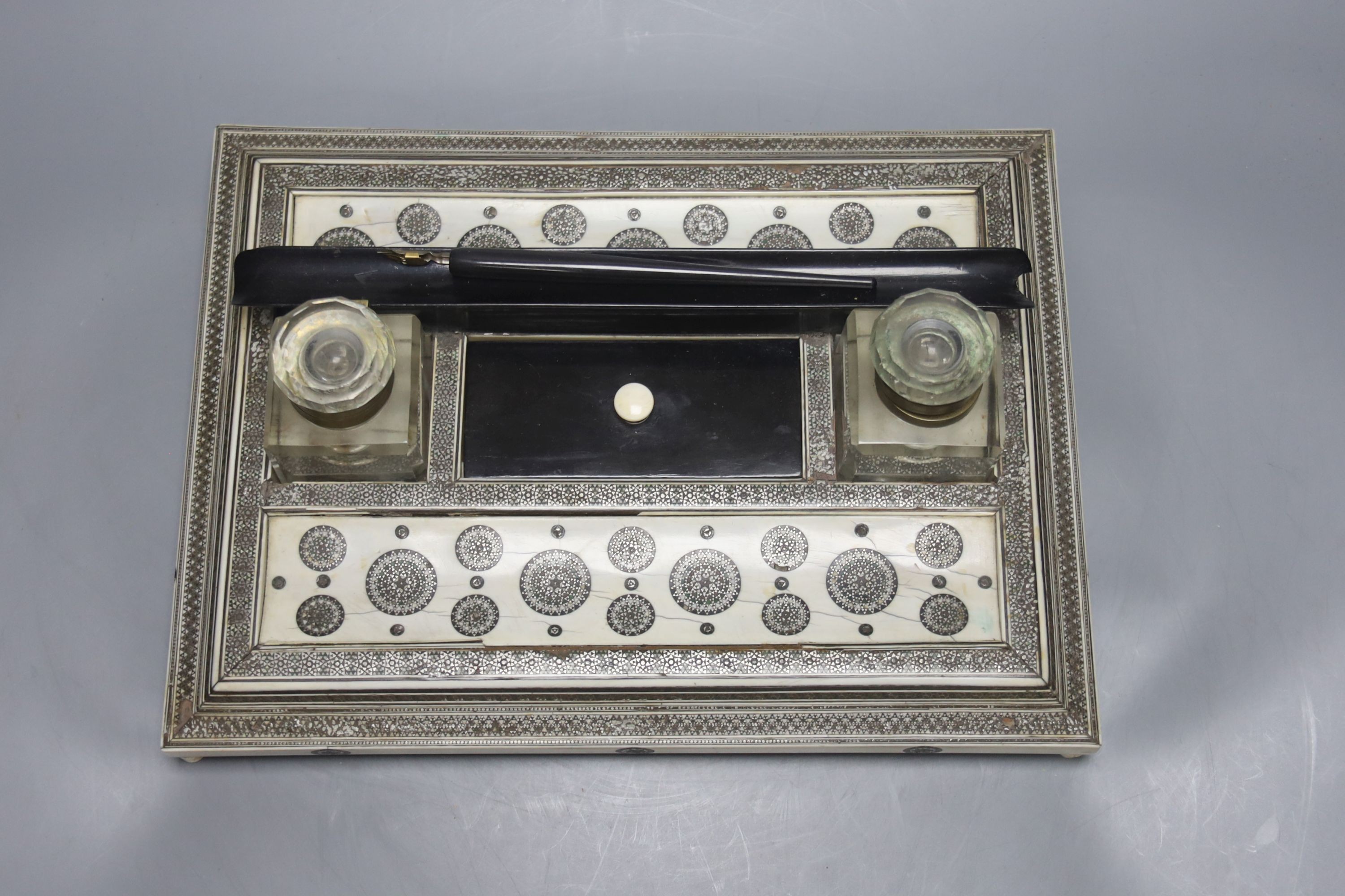 A 19th century Southern Indian ivory and ebony sadeli work inkstand 29cm